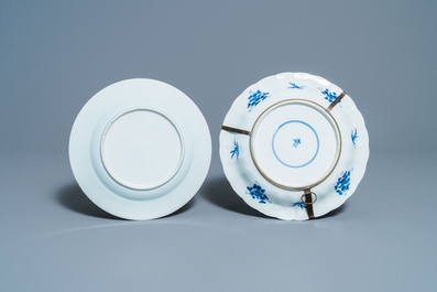 Eighteen Chinese blue and white saucers, seven cups, two dishes and a tea caddy, Kangxi/Qianlong