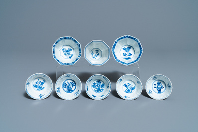 Nineteen Chinese blue and white cups and twenty-one saucers, Kangxi and later