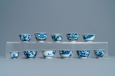 Nineteen Chinese blue and white cups and twenty-one saucers, Kangxi and later