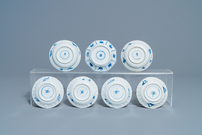 Nineteen Chinese blue and white cups and twenty-one saucers, Kangxi and later