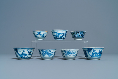 Eighteen Chinese blue and white saucers, seven cups, two dishes and a tea caddy, Kangxi/Qianlong