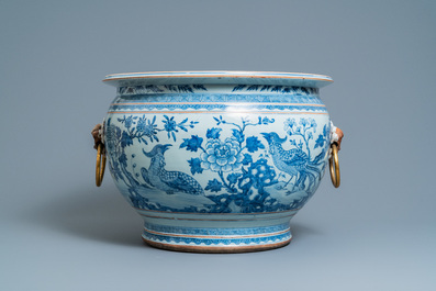 A large Chinese blue and white fishbowl with gilt bronze handles, Qianlong