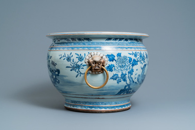 A large Chinese blue and white fishbowl with gilt bronze handles, Qianlong