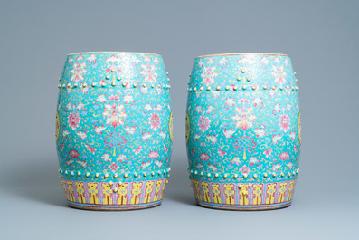 A pair of Chinese turquoise-ground famille rose garden seats, 19th C.