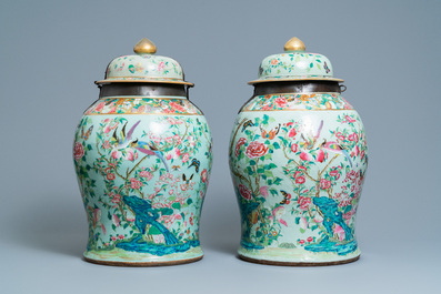 A pair of large Chinese Canton famille rose celadon-ground vases and covers, 19th C.