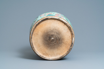 A pair of large Chinese Canton famille rose celadon-ground vases and covers, 19th C.