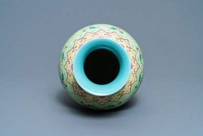A Chinese famille rose lime-green-ground vase, Qianlong mark, 19/20th C.
