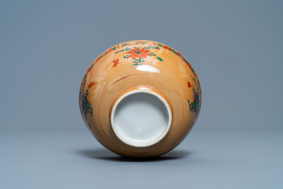 A Chinese capucine brown-ground famille verte plate and a bowl, Kangxi