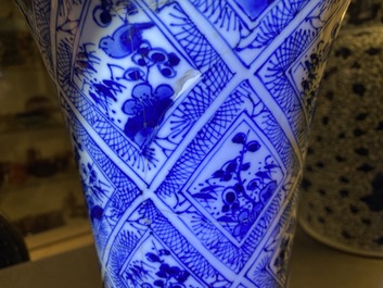 A large Chinese blue and white five-piece garniture with floral and landscape panels, Kangxi