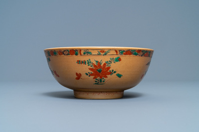 A Chinese capucine brown-ground famille verte plate and a bowl, Kangxi