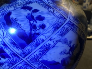 A large Chinese blue and white five-piece garniture with floral and landscape panels, Kangxi