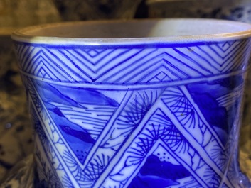 A large Chinese blue and white five-piece garniture with floral and landscape panels, Kangxi