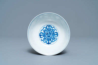 A Chinese blue and white 'dragon' bowl with a double vajra in the centre, Chenghua mark, Kangxi