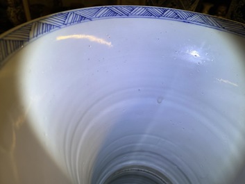 A large Chinese blue and white five-piece garniture with floral and landscape panels, Kangxi