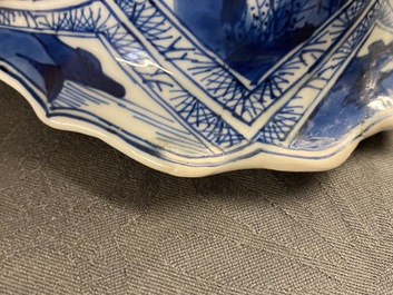 A large Chinese blue and white five-piece garniture with floral and landscape panels, Kangxi