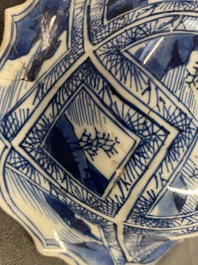 A large Chinese blue and white five-piece garniture with floral and landscape panels, Kangxi