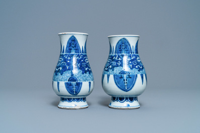 A pair of Chinese blue and white 'taotie' vases, Kangxi