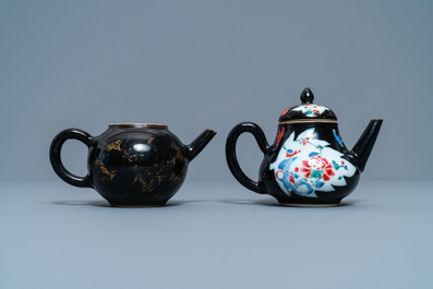 Two Chinese famille noire teapots, a pattipan and two spoon trays, Yongzheng/Qianlong