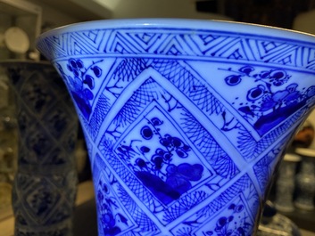 A large Chinese blue and white five-piece garniture with floral and landscape panels, Kangxi