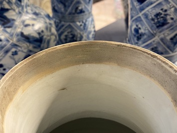 A large Chinese blue and white five-piece garniture with floral and landscape panels, Kangxi
