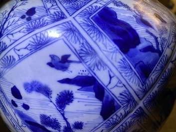 A large Chinese blue and white five-piece garniture with floral and landscape panels, Kangxi