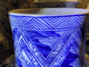 A large Chinese blue and white five-piece garniture with floral and landscape panels, Kangxi