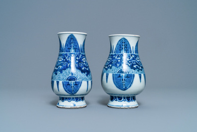 A pair of Chinese blue and white 'taotie' vases, Kangxi