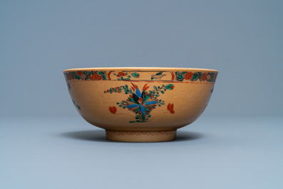 A Chinese capucine brown-ground famille verte plate and a bowl, Kangxi