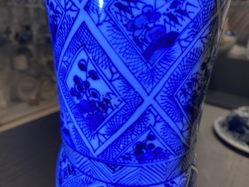 A large Chinese blue and white five-piece garniture with floral and landscape panels, Kangxi