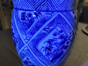 A large Chinese blue and white five-piece garniture with floral and landscape panels, Kangxi