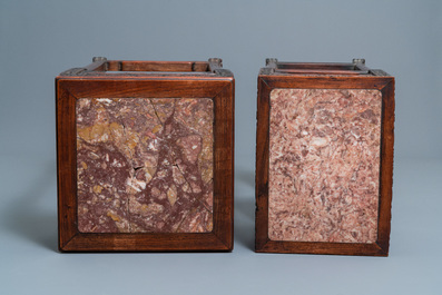 Two Chinese hongmu wooden stands with marble tops, 19th C.