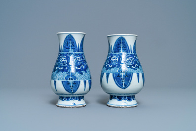 A pair of Chinese blue and white 'taotie' vases, Kangxi