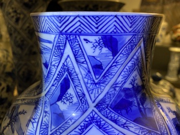 A large Chinese blue and white five-piece garniture with floral and landscape panels, Kangxi