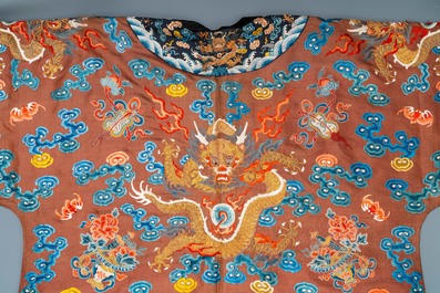 A Chinese embroidered silk brown-ground 'dragon' robe, 18/19th C.