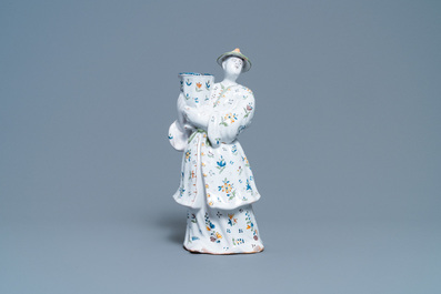 Un bougeoir en forme de chinois en fa&iuml;ence de Lille polychrome, France, 18&egrave;me