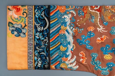 A Chinese embroidered silk brown-ground 'dragon' robe, 18/19th C.