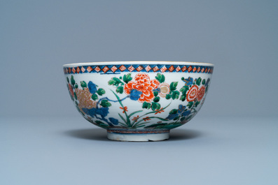 A Chinese famille verte bowl and an iron-red dish, Kangxi