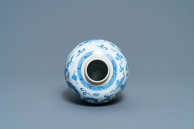 A Chinese blue and white 'dragon and phoenix' jar with wooden lid, Chenghua mark, Kangxi