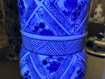 A large Chinese blue and white five-piece garniture with floral and landscape panels, Kangxi