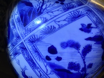 A large Chinese blue and white five-piece garniture with floral and landscape panels, Kangxi