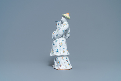 Un bougeoir en forme de chinois en fa&iuml;ence de Lille polychrome, France, 18&egrave;me