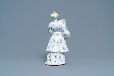Un bougeoir en forme de chinois en fa&iuml;ence de Lille polychrome, France, 18&egrave;me