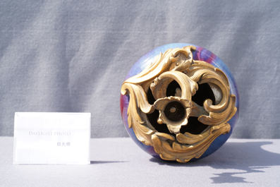 A Chinese flamb&eacute;-glazed vase with gilt bronze candelabra mount, 19th C.