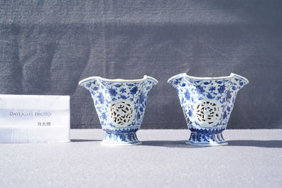 A pair of rare Chinese blue and white double-walled reticulated trilobed libation cups, Qianlong