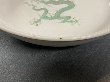 A Chinese incised and green-glazed 'dragon' dish, Hongzhi mark, Ming