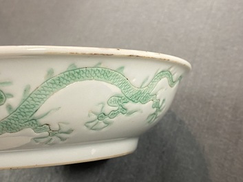 A Chinese incised and green-glazed 'dragon' dish, Hongzhi mark, Ming