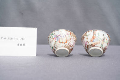 A pair of fine Chinese famille rose 'Mandarin' cups and saucers, Qianlong
