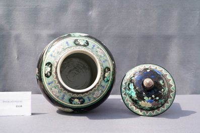 A Chinese famille noire vase and cover, 19th C.