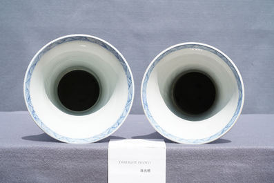 A large Chinese blue and white five-piece garniture with floral and landscape panels, Kangxi