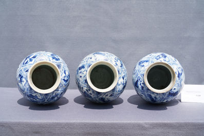 A large Chinese blue and white five-piece garniture with floral and landscape panels, Kangxi